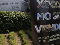 Residents of the town of Xoco in Coyoacan, Mexico City, place signs and banners outside the Mitikah shopping mall to protest the constructio...