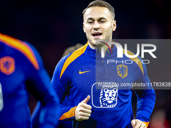 Netherlands midfielder Teun Koopmeiners participates in the match between the Netherlands and Hungary at the Johan Cruijff ArenA for the UEF...