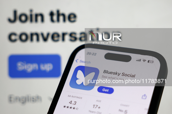 Bluesky Social website displayed on a laptop screen and Bluesky Social on App Store displayed on a phone screen are seen in this illustratio...