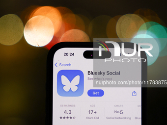 Bluesky Social on App Store displayed on a phone screen is seen in this illustration photo taken in Poland on November 16, 2024. (