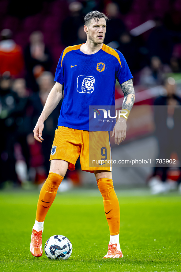 Netherlands forward Wout Weghorst participates in the match between the Netherlands and Hungary at the Johan Cruijff ArenA for the UEFA Nati...