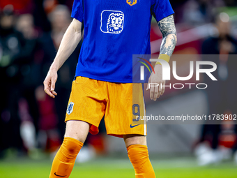 Netherlands forward Wout Weghorst participates in the match between the Netherlands and Hungary at the Johan Cruijff ArenA for the UEFA Nati...