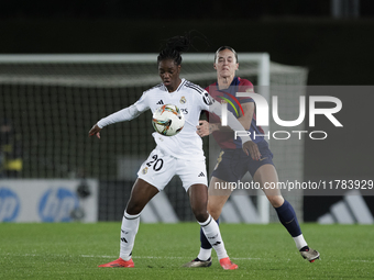 Naomie Feller of Real Madrid and Mapi Leon of FC Barcelona fight for the ball during the LIGA F match between Real Madrid and FC Barcelona a...