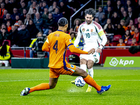 Hungary midfielder Dominik Szoboszlai and Netherlands defender Virgil van Dijk play during the match between the Netherlands and Hungary at...