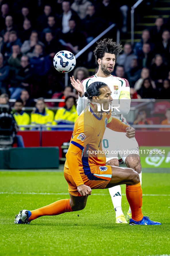 Hungary midfielder Dominik Szoboszlai and Netherlands defender Virgil van Dijk play during the match between the Netherlands and Hungary at...