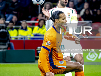 Hungary midfielder Dominik Szoboszlai and Netherlands defender Virgil van Dijk play during the match between the Netherlands and Hungary at...