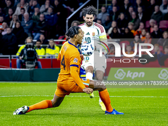 Hungary midfielder Dominik Szoboszlai and Netherlands defender Virgil van Dijk play during the match between the Netherlands and Hungary at...