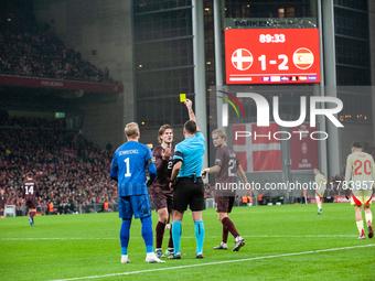 Joachim Andersen of Denmark receives a yellow card during the Nations League Round 5 match between Denmark and Spain at Parken Stadium in Co...