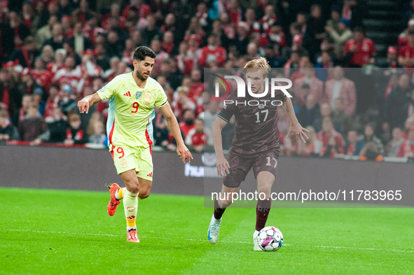 Victor Kristiansen of Denmark controls the ball during the Nations League Round 5 match between Denmark and Spain at Parken Stadium in Copen...