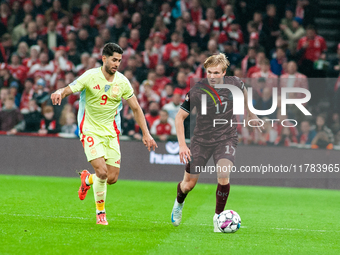 Victor Kristiansen of Denmark controls the ball during the Nations League Round 5 match between Denmark and Spain at Parken Stadium in Copen...