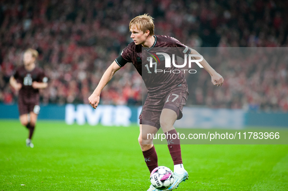 Victor Kristiansen of Denmark controls the ball during the Nations League Round 5 match between Denmark and Spain at Parken Stadium in Copen...