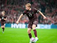 Victor Kristiansen of Denmark controls the ball during the Nations League Round 5 match between Denmark and Spain at Parken Stadium in Copen...