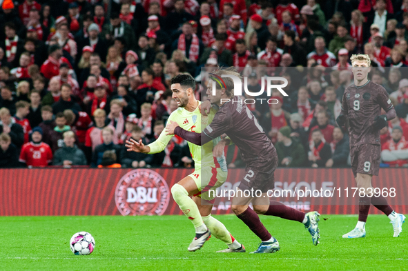 Mikel Merino of Spain fights for the ball with Joachim Andersen of Denmark during the Nations League Round 5 match between Denmark and Spain...