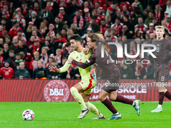 Mikel Merino of Spain fights for the ball with Joachim Andersen of Denmark during the Nations League Round 5 match between Denmark and Spain...