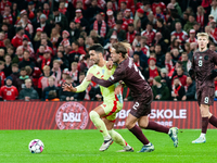 Mikel Merino of Spain fights for the ball with Joachim Andersen of Denmark during the Nations League Round 5 match between Denmark and Spain...