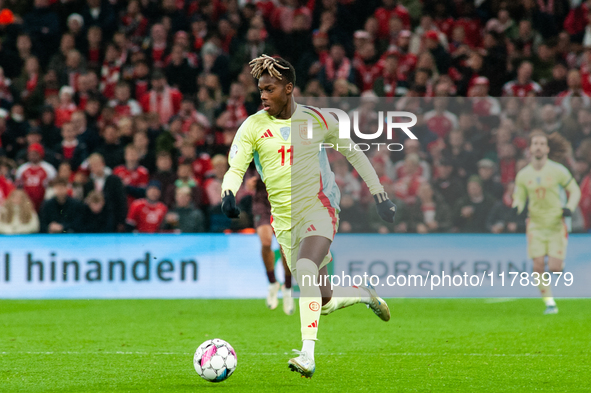 Nico Williams of Spain controls the ball during the Nations League Round 5 match between Denmark and Spain at Parken Stadium in Copenhagen,...