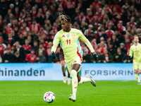 Nico Williams of Spain controls the ball during the Nations League Round 5 match between Denmark and Spain at Parken Stadium in Copenhagen,...