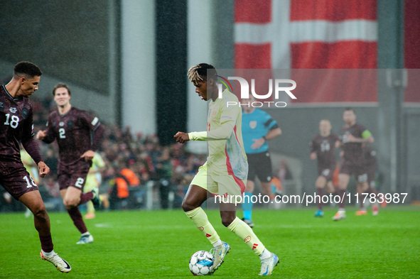 Nico Williams of Spain controls the ball during the Nations League Round 5 match between Denmark and Spain at Parken Stadium in Copenhagen,...