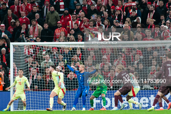 Kasper Schmeichel of Denmark and David Raya of Spain participate in the Nations League Round 5 match between Denmark and Spain at Parken Sta...