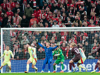 Kasper Schmeichel of Denmark and David Raya of Spain participate in the Nations League Round 5 match between Denmark and Spain at Parken Sta...