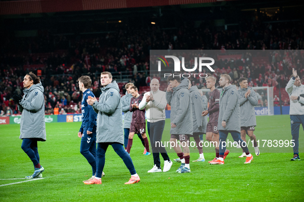 On November 15, 2024, in Copenhagen, Denmark, Brian Riemer, the head coach of Denmark, talks with Christian Norgaard of Denmark at full time...