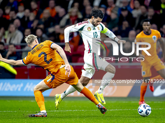 Netherlands defender Jan-Paul van Hecke and Hungary midfielder Dominik Szoboszlai participate in the match between the Netherlands and Hunga...