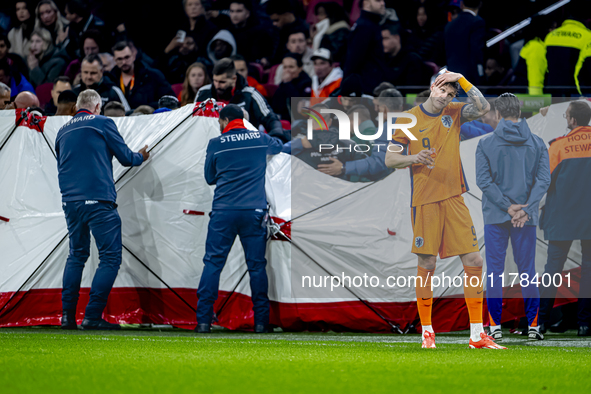 Netherlands forward Wout Weghorst participates in the match between the Netherlands and Hungary at the Johan Cruijff ArenA for the UEFA Nati...