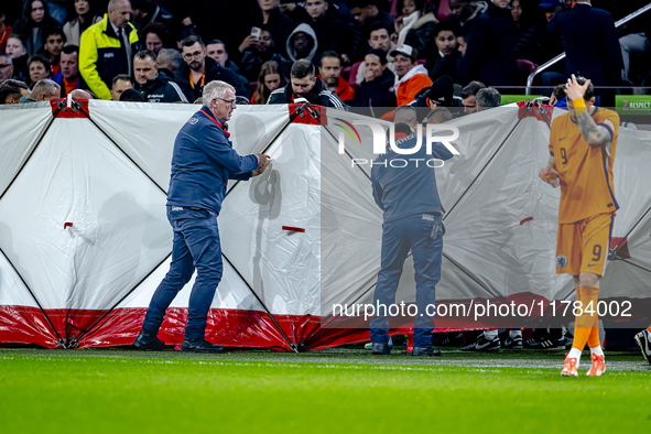 A medical assistant is with the assistant trainer of Hungary during the match between the Netherlands and Hungary at the Johan Cruijff ArenA...