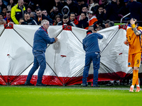 A medical assistant is with the assistant trainer of Hungary during the match between the Netherlands and Hungary at the Johan Cruijff ArenA...