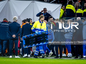 A medical assistant is with the assistant trainer of Hungary during the match between the Netherlands and Hungary at the Johan Cruijff ArenA...