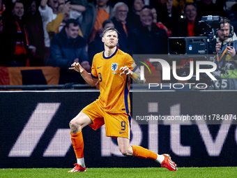 Netherlands forward Wout Weghorst scores the 1-0 and celebrates the goal during the match between the Netherlands and Hungary at the Johan C...