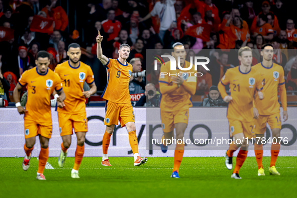 Netherlands forward Wout Weghorst scores the 1-0 and celebrates the goal during the match between the Netherlands and Hungary at the Johan C...