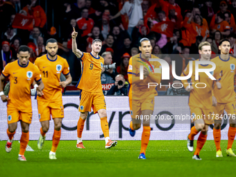 Netherlands forward Wout Weghorst scores the 1-0 and celebrates the goal during the match between the Netherlands and Hungary at the Johan C...