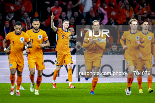 Netherlands forward Wout Weghorst scores the 1-0 and celebrates the goal during the match between the Netherlands and Hungary at the Johan C...