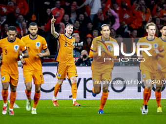 Netherlands forward Wout Weghorst scores the 1-0 and celebrates the goal during the match between the Netherlands and Hungary at the Johan C...