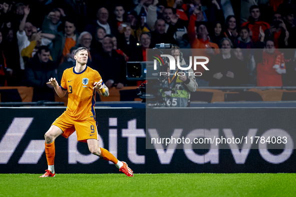 Netherlands forward Wout Weghorst scores the 1-0 and celebrates the goal during the match between the Netherlands and Hungary at the Johan C...