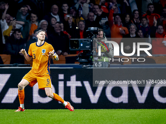 Netherlands forward Wout Weghorst scores the 1-0 and celebrates the goal during the match between the Netherlands and Hungary at the Johan C...