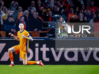 Netherlands forward Wout Weghorst scores the 1-0 and celebrates the goal during the match between the Netherlands and Hungary at the Johan C...