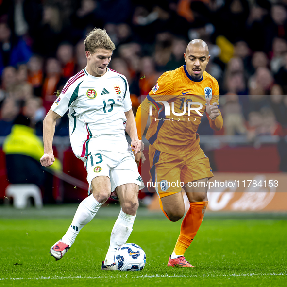 Hungary midfielder Andras Schafer and Netherlands forward Donyell Malen participate in the match between the Netherlands and Hungary at the...