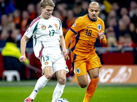 Hungary midfielder Andras Schafer and Netherlands forward Donyell Malen participate in the match between the Netherlands and Hungary at the...