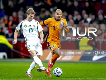 Hungary midfielder Andras Schafer and Netherlands forward Donyell Malen participate in the match between the Netherlands and Hungary at the...