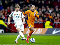 Hungary midfielder Andras Schafer and Netherlands forward Donyell Malen participate in the match between the Netherlands and Hungary at the...