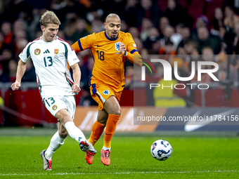 Hungary midfielder Andras Schafer and Netherlands forward Donyell Malen participate in the match between the Netherlands and Hungary at the...