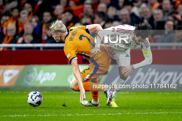 Netherlands defender Jan-Paul van Hecke and Hungary midfielder Dominik Szoboszlai participate in the match between the Netherlands and Hunga...