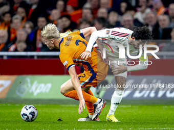 Netherlands defender Jan-Paul van Hecke and Hungary midfielder Dominik Szoboszlai participate in the match between the Netherlands and Hunga...