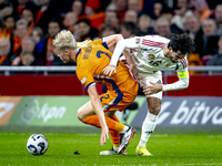 Netherlands defender Jan-Paul van Hecke and Hungary midfielder Dominik Szoboszlai participate in the match between the Netherlands and Hunga...