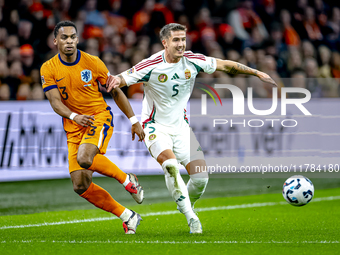 Netherlands defender Jurrien Timber and Hungary midfielder Tamas Nikitscher play during the match between the Netherlands and Hungary at the...