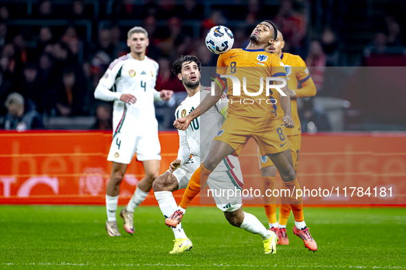 Hungary midfielder Dominik Szoboszlai and Netherlands midfielder Ryan Gravenberch play during the match between the Netherlands and Hungary...