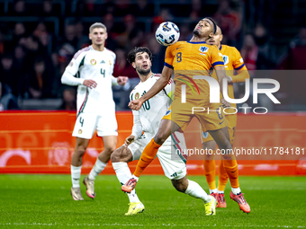 Hungary midfielder Dominik Szoboszlai and Netherlands midfielder Ryan Gravenberch play during the match between the Netherlands and Hungary...