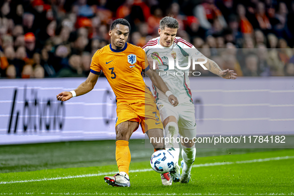 Netherlands defender Jurrien Timber and Hungary midfielder Tamas Nikitscher play during the match between the Netherlands and Hungary at the...